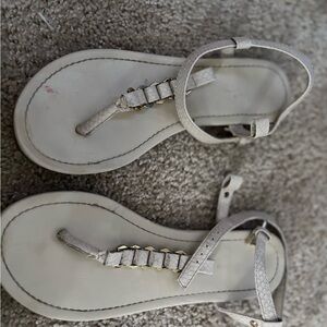 Stylish White Sandals with Gold Accents